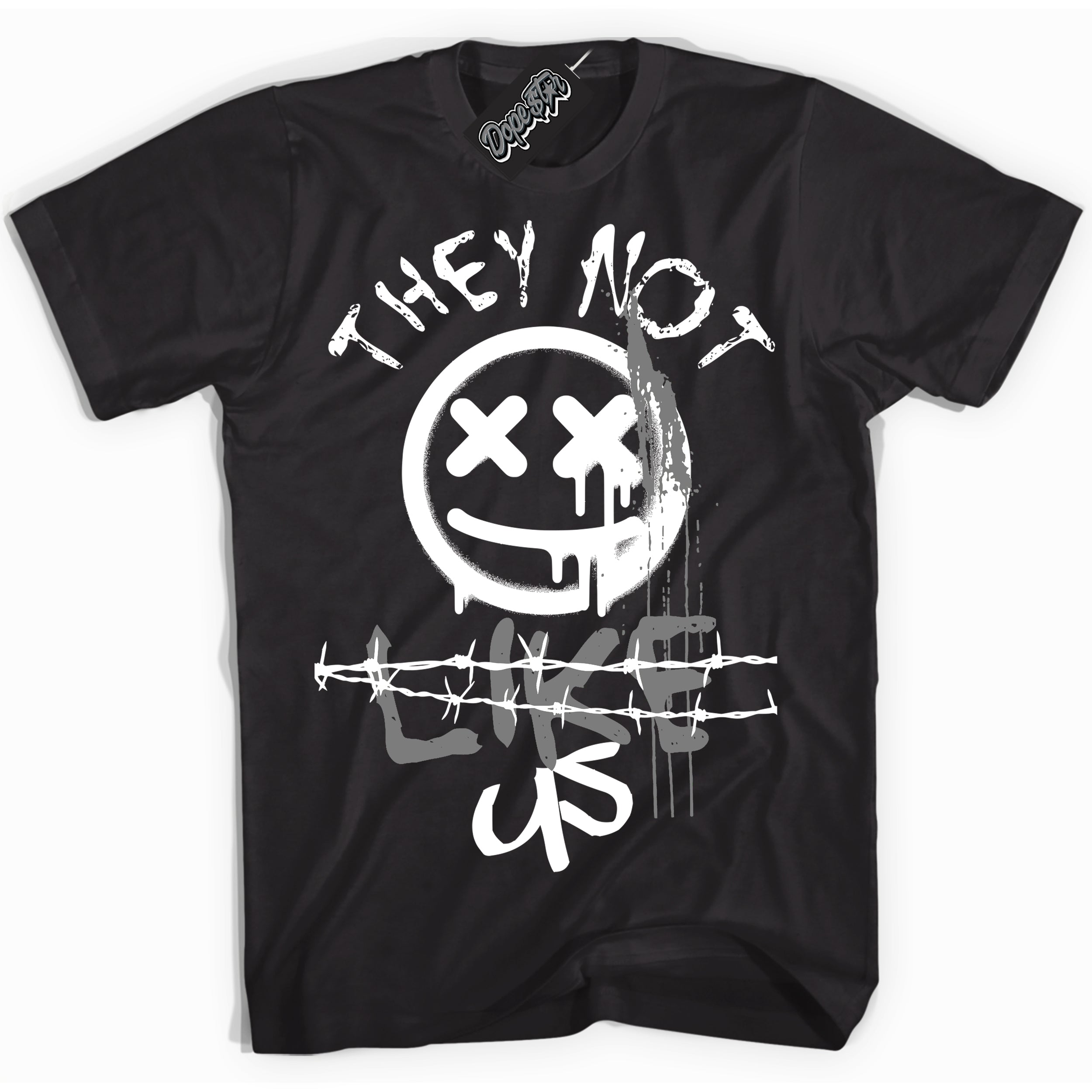 Black “They Not Like Us” T-shirt by Dope Star Brand®, styled to match Shadow 1s sneakers
