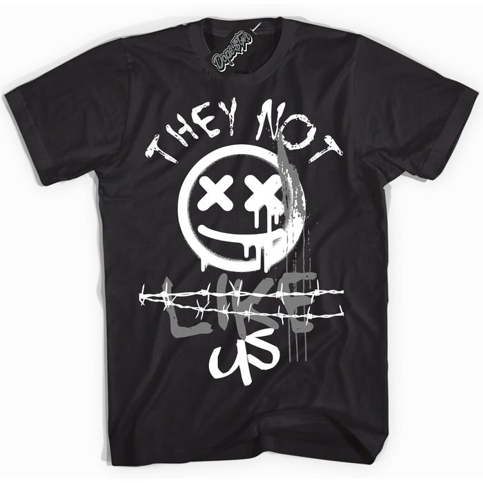 Black “They Not Like Us” T-shirt by Dope Star Brand®, styled to match Shadow 1s sneakers
