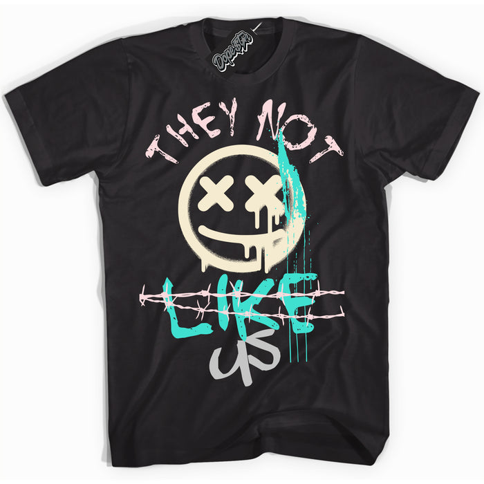 Black “They Not Like Us” T-shirt by Dope Star Brand®, styled to match Soft Pearl 1s sneakers

