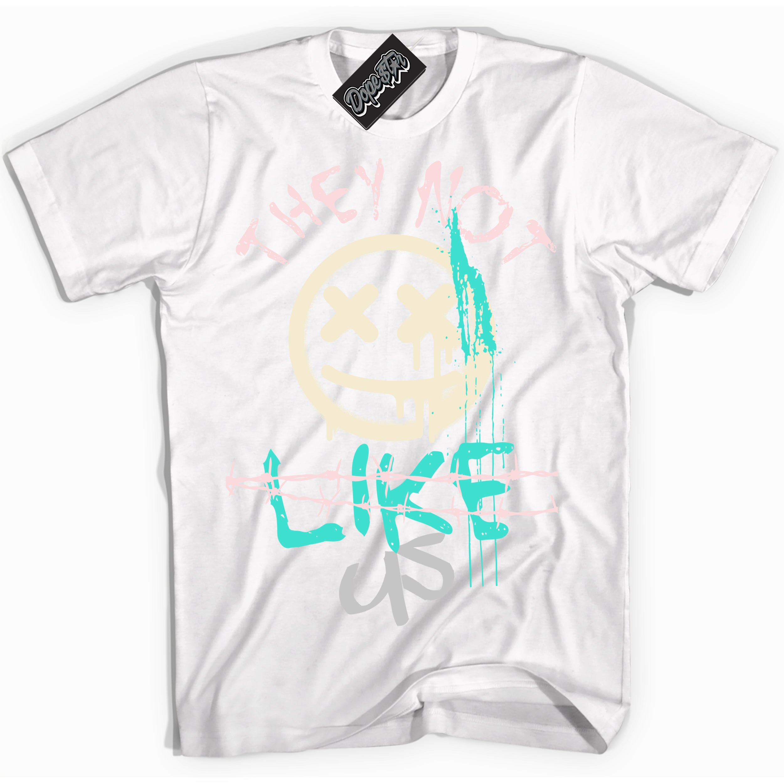 White “They Not Like Us” T-shirt by Dope Star Brand®, styled to match Soft Pearl 1s sneakers
