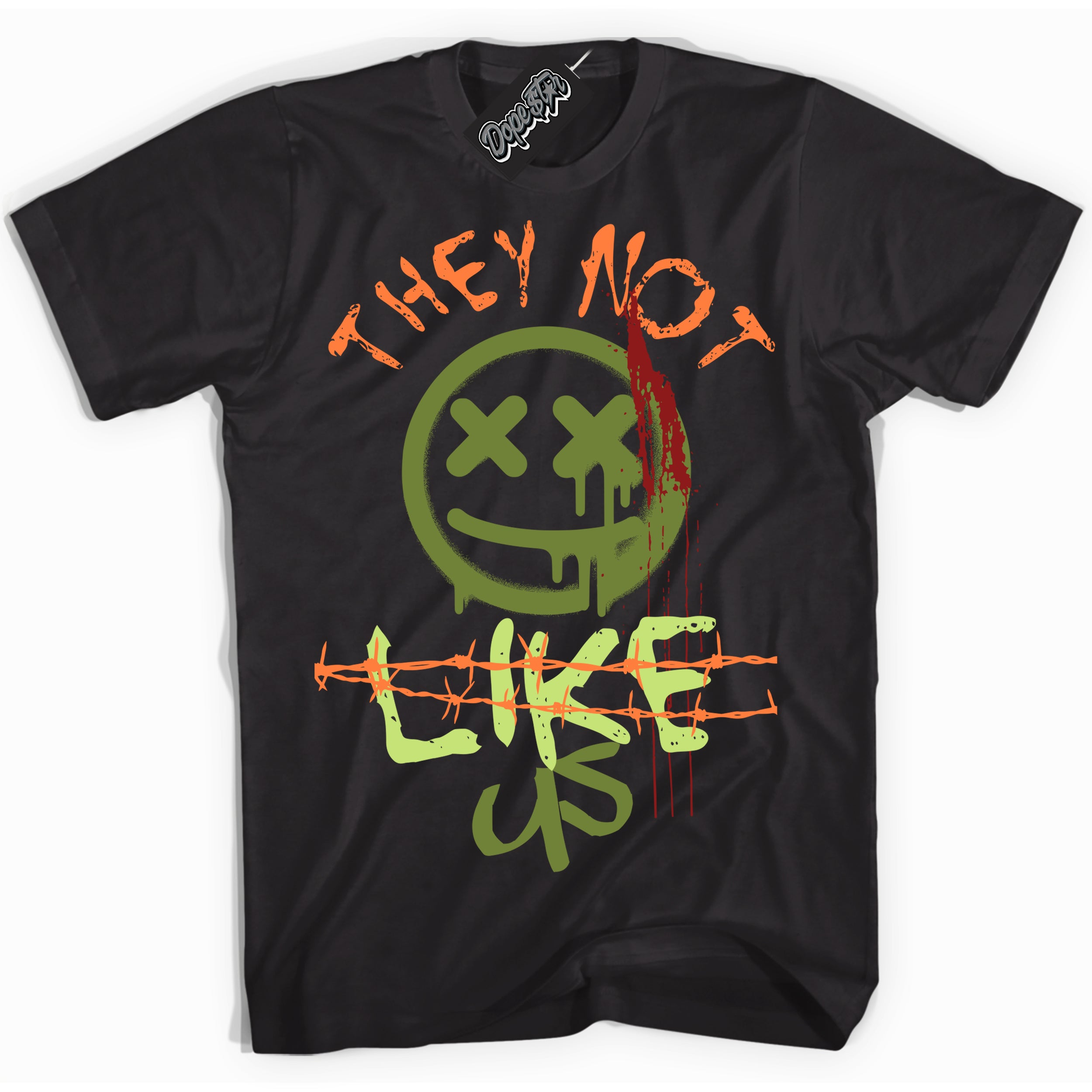 Black “They Not Like Us” T-shirt by Dope Star Brand®, styled to match Green Curry Dunk sneakers
