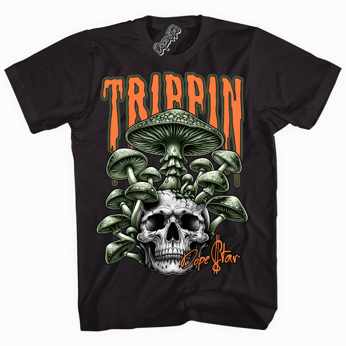 Cool Black graphic tee with “ Trippin ” print, that perfectly matches Olive 5s sneakers 